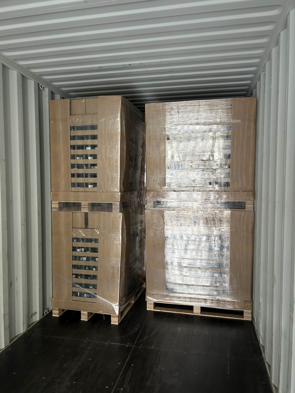 pallet packed tin cartons inside shipping container