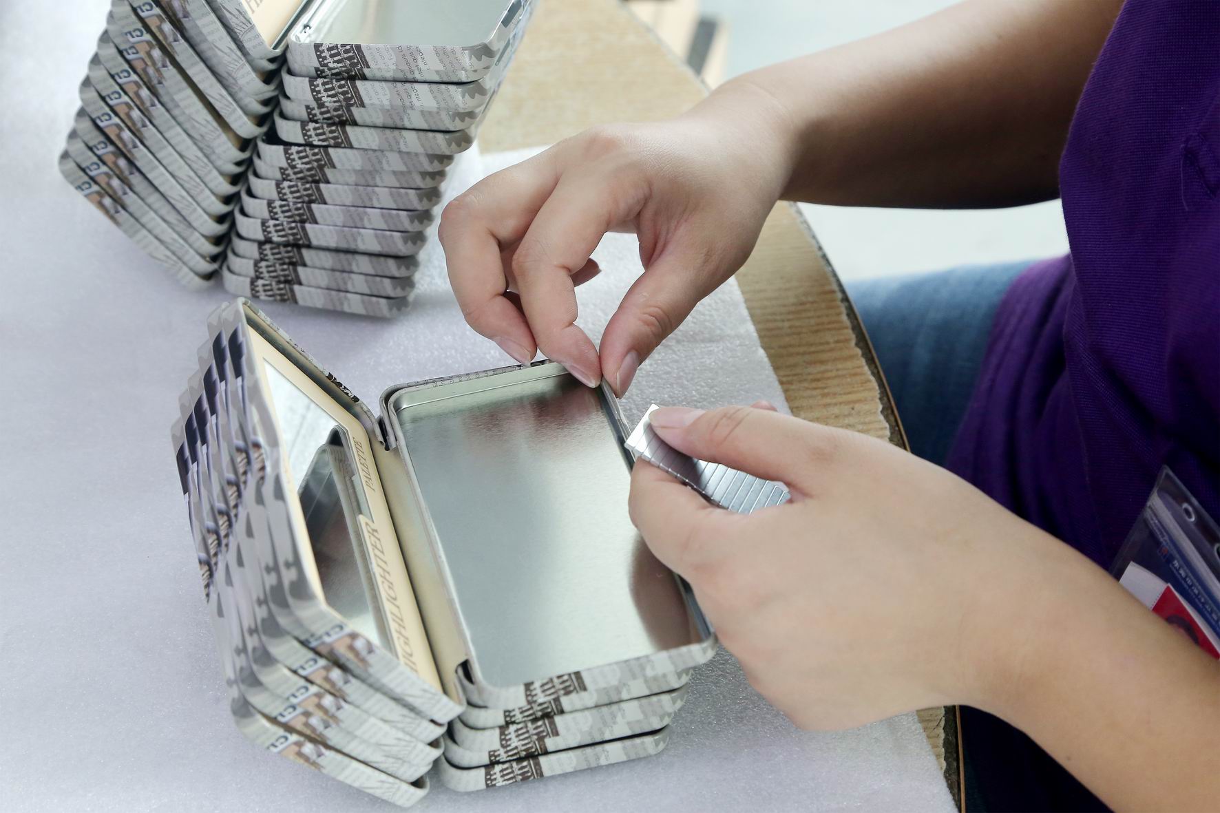 cookie tin lid fitting by hand