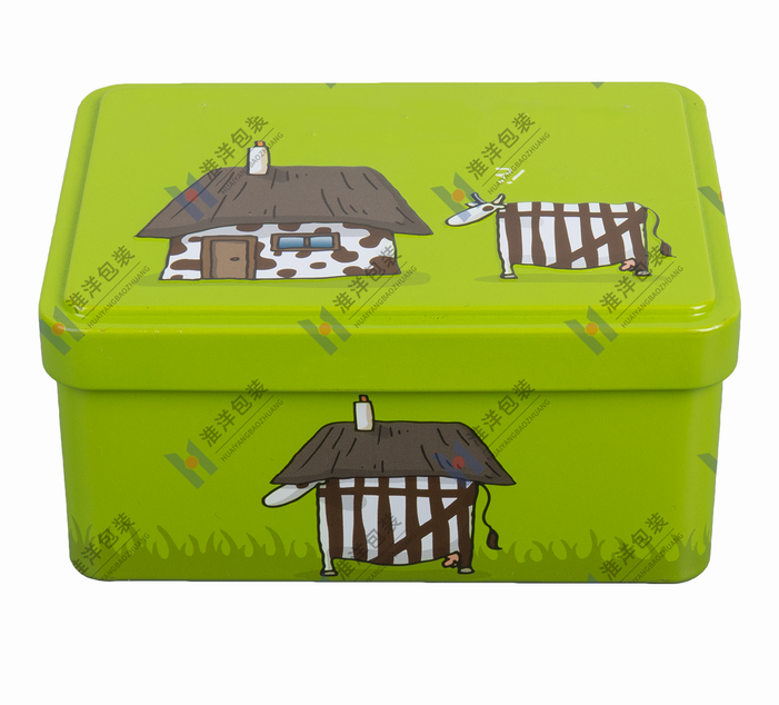 rectangular chocolate tin with illustrated lid artwork