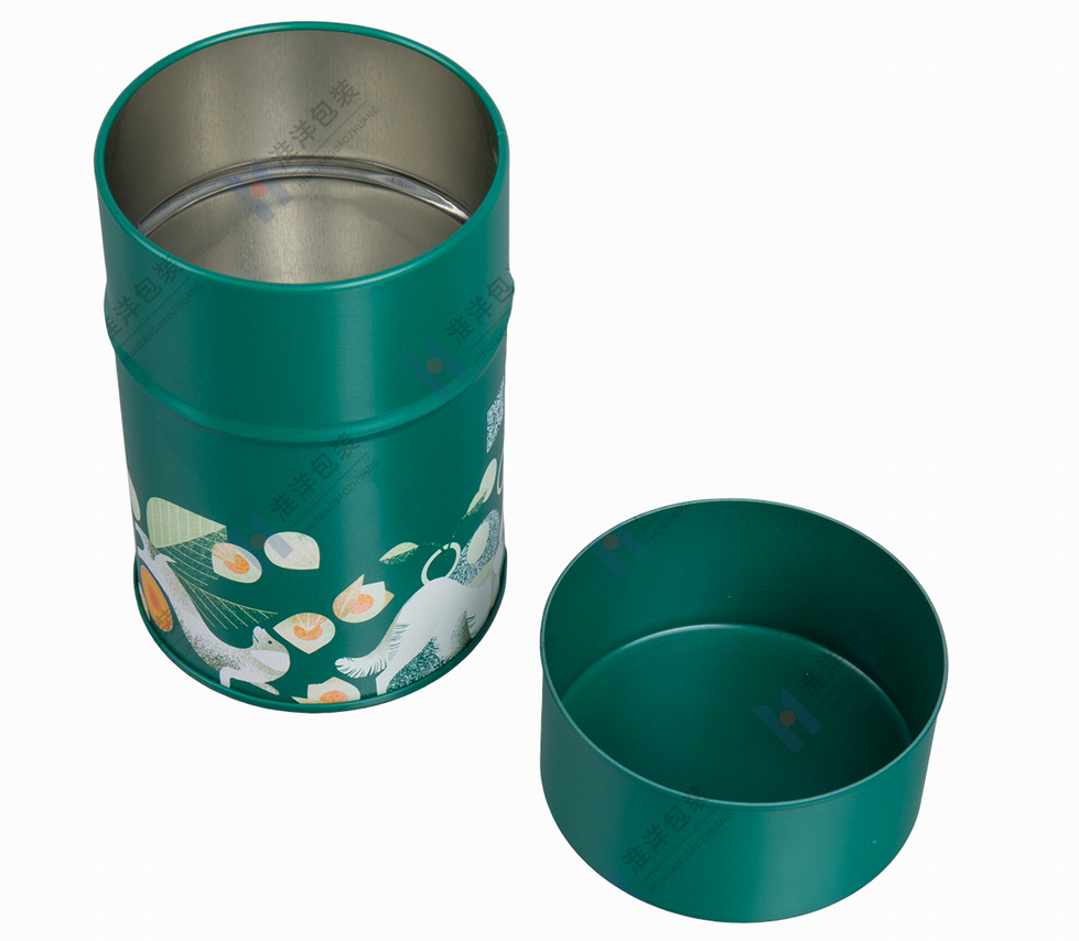 green cylinder tea tin container with floral printing